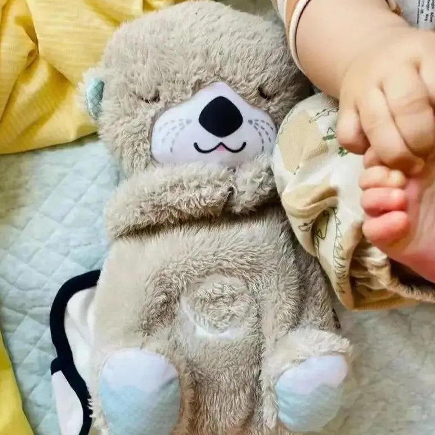 CuddleOtter™ | koselig sovende oter