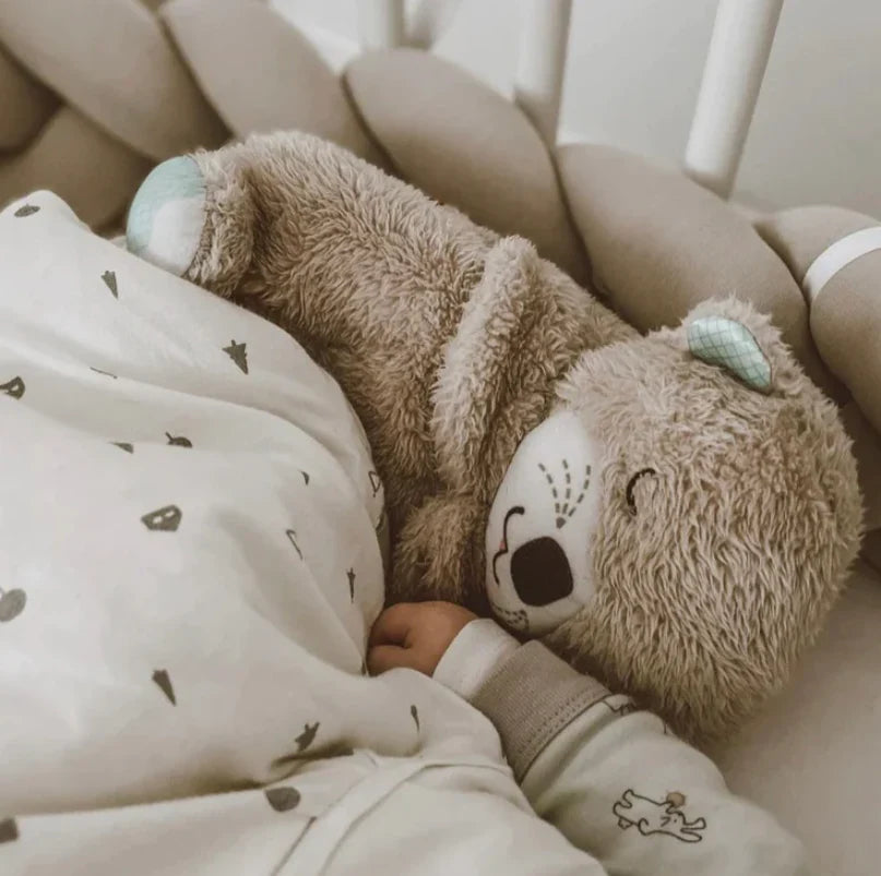 CuddleOtter™ | koselig sovende oter